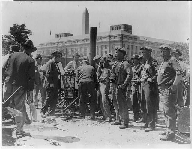 Bonus Army men at their portable kitchen near 12th Street S.W., Washington, D.C., 1932.