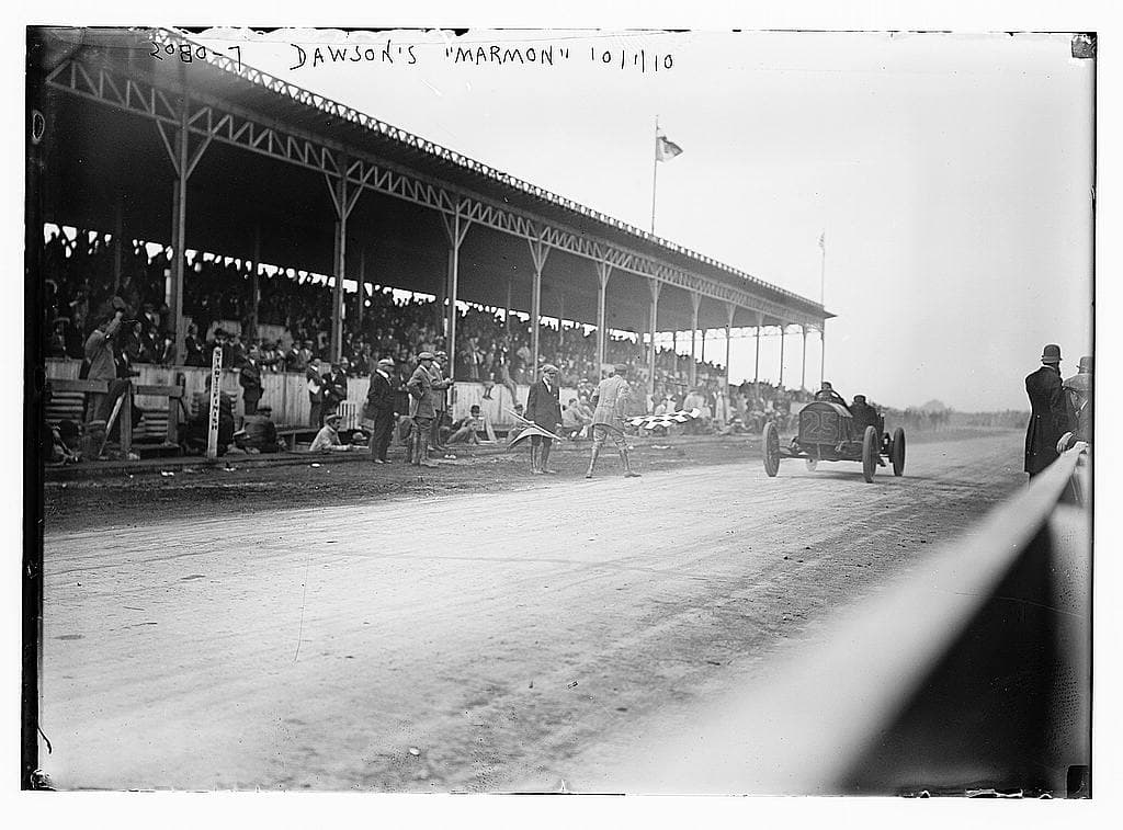 The same car and the same day, seen along the front of the grandstand.