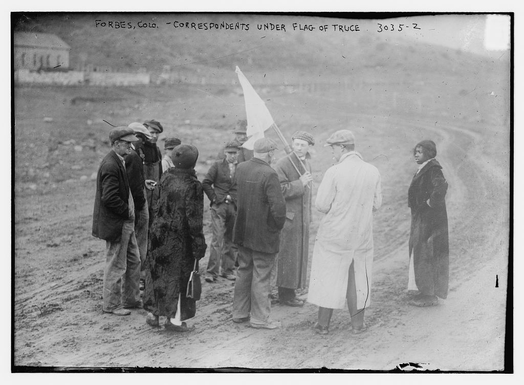 Correspondents under a flag of truce at Forbes, Colorado, ten miles from Ludlow.