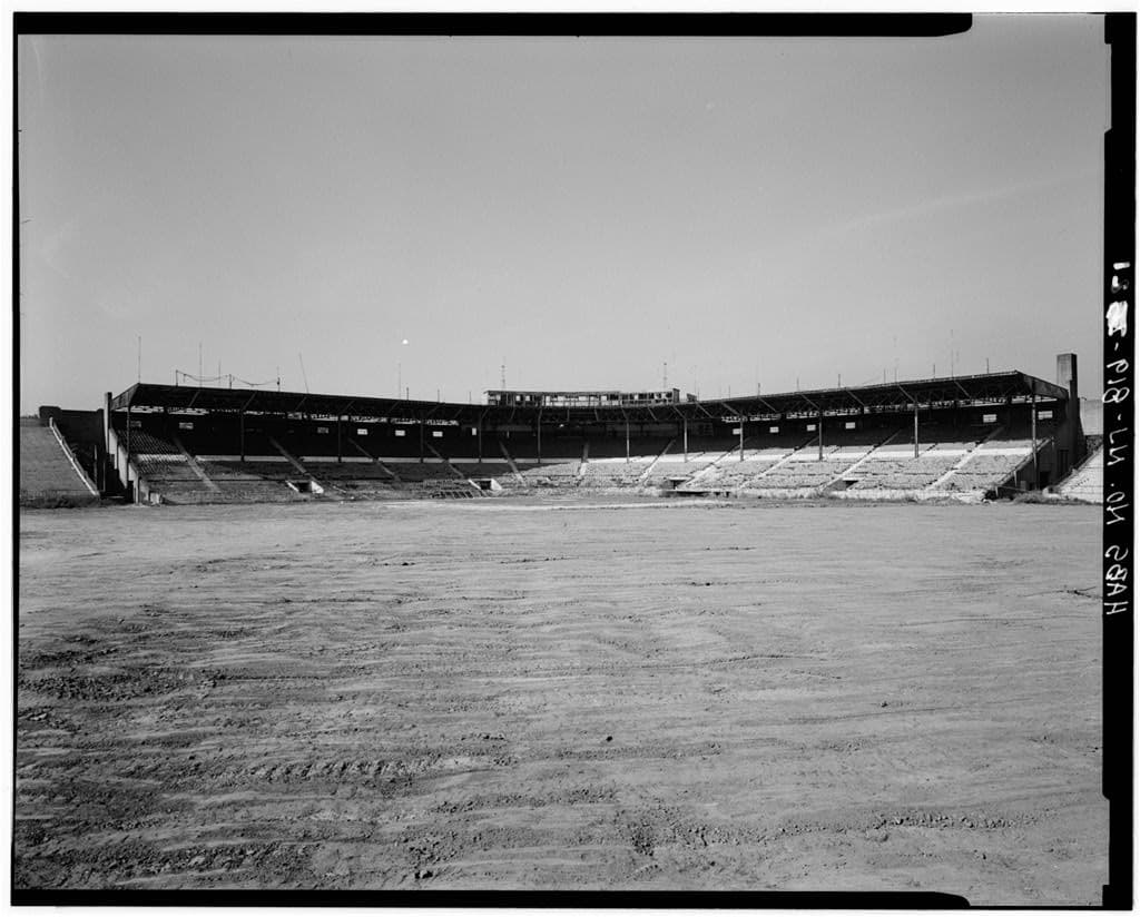 The grandstand seen from the east, across the field.