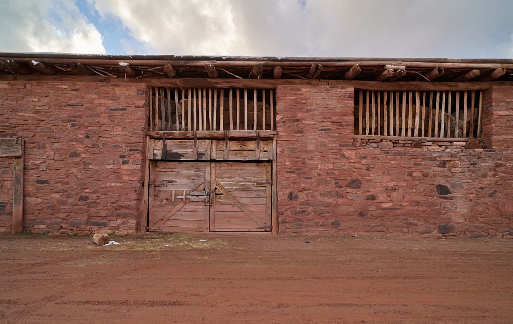 A stone and timber range of the post, still standing at Ganado.