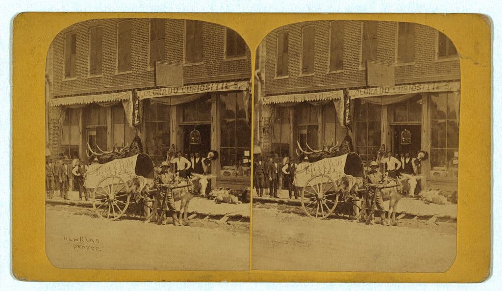 A stereograph of 16th Street, Denver, about 1875, outside a shop called Colorado Curiosities.