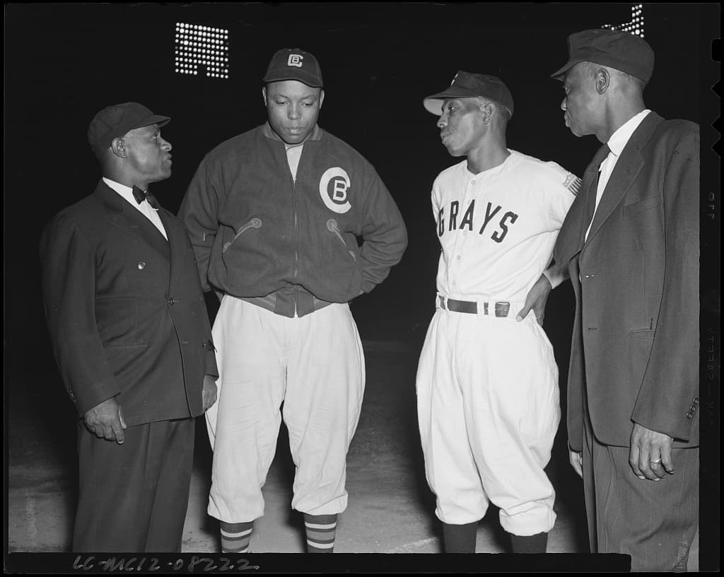 Vic Harris of the Grays with Quincy Trouppe of the Buckeyes, East-West game, 1946.