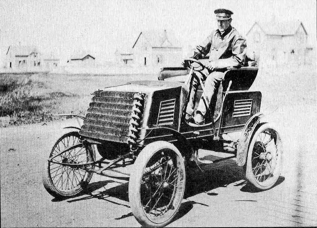Charles T. Jeffery in the 1901 Rambler prototype. The steering wheel did not reach the production car.