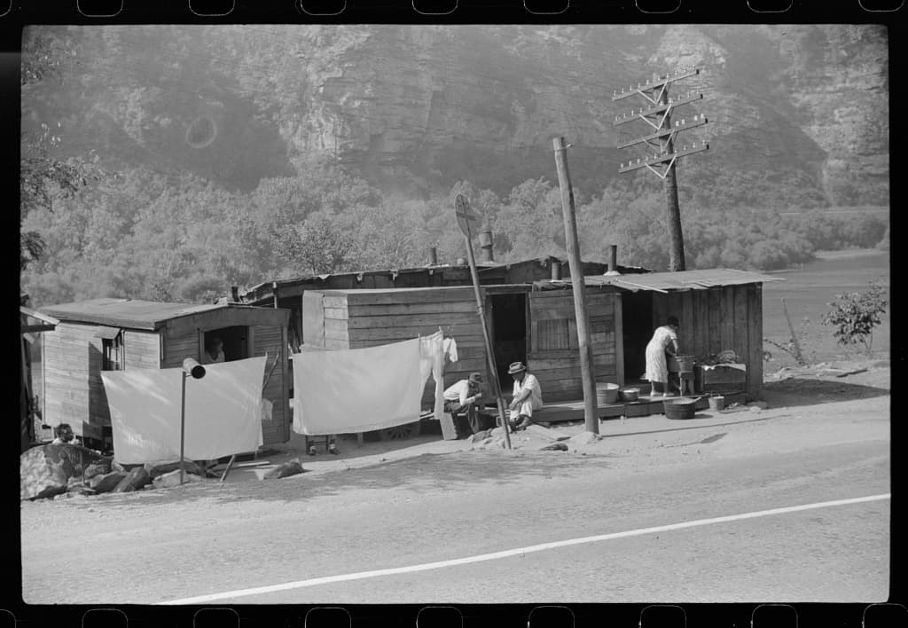 Roadside housing on the highway between Charleston and Gauley Bridge, September 1938.