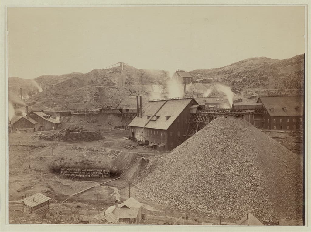 The Homestake works and its waste rock, 1889.