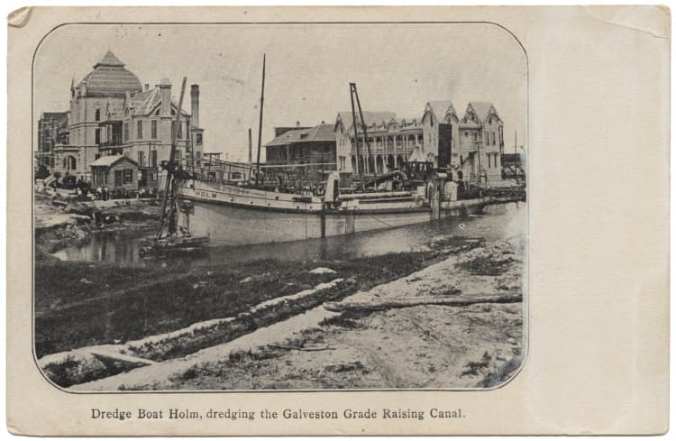 The dredge boat Holm cutting the grade raising canal, on a 1904 postcard.