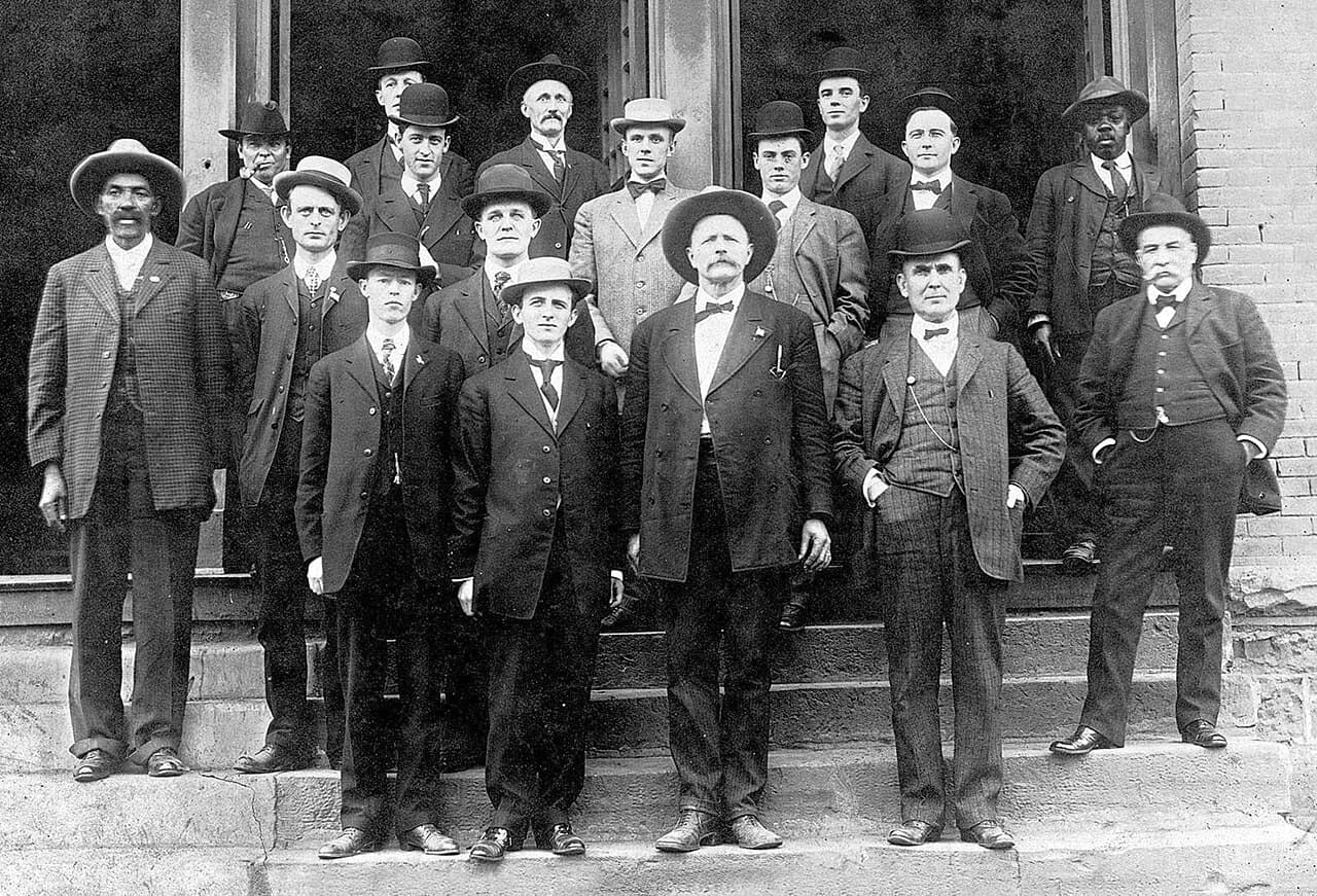 A federal official group portrait of November 1907. The record places Reeves at the left and names nobody else.