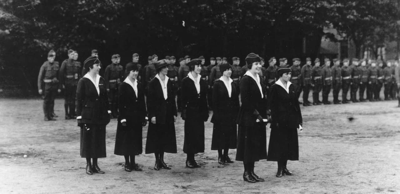 Suzanne Prevot and Marie A. LeBlanc, front row, are decorated in July 1919.
