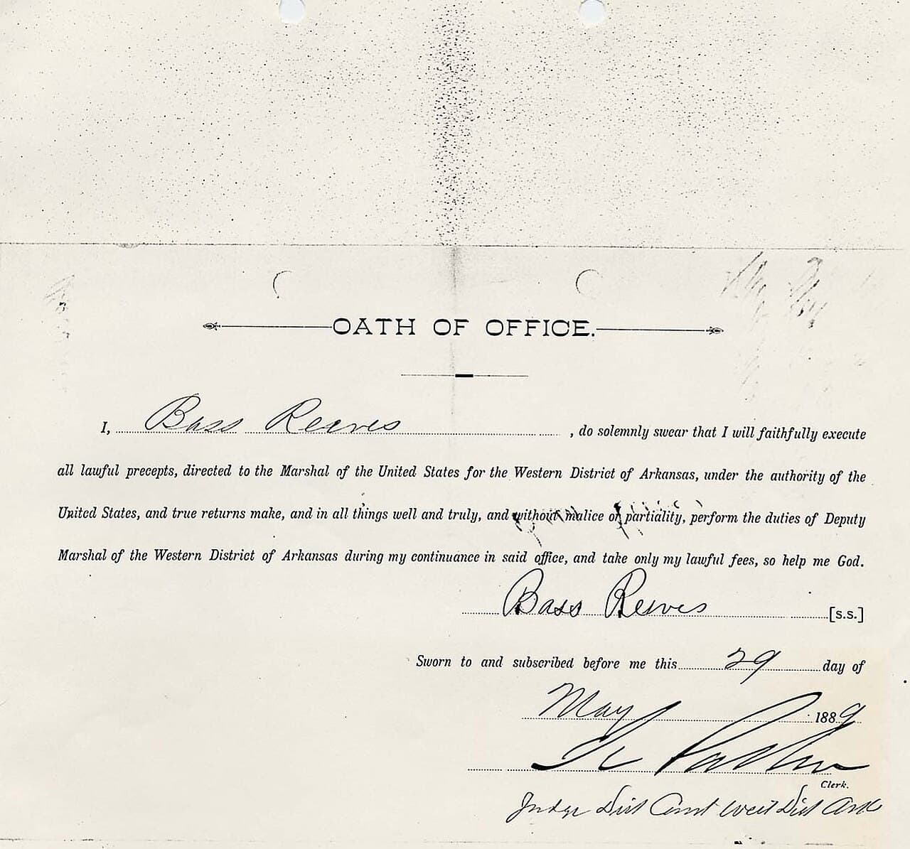 His oath of office as a deputy marshal, sworn on 20 February 1897, held by the National Archives.
