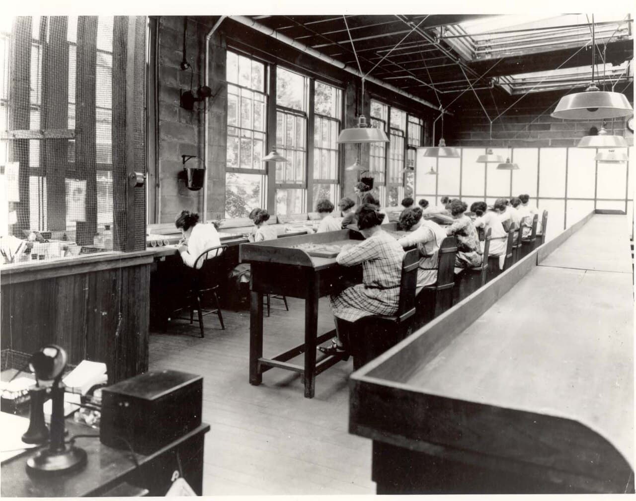 Dial painters at work in a United States Radium Corporation factory, about 1922.