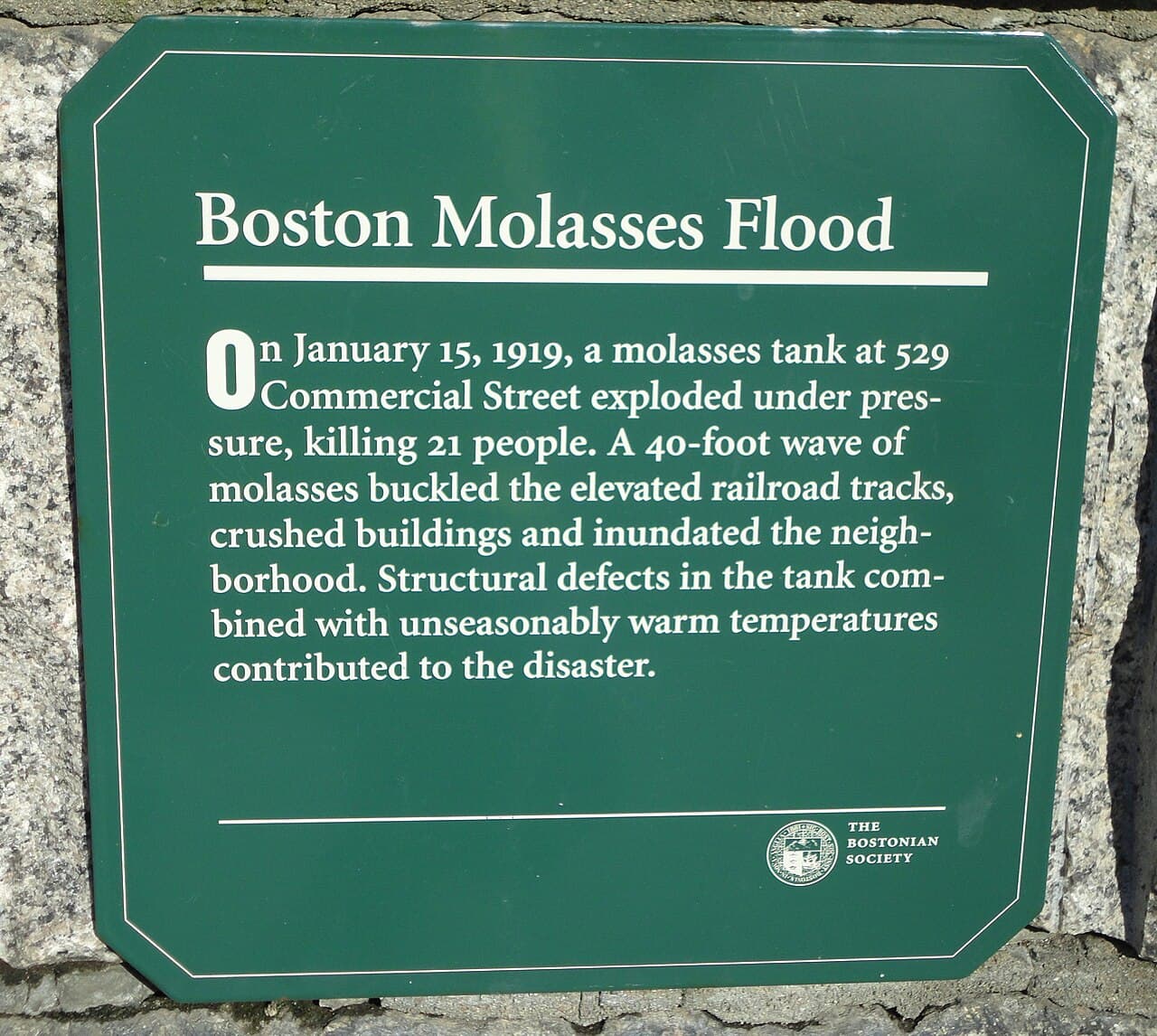 The Bostonian Society plaque. It gives the wave as forty feet and it names nobody.